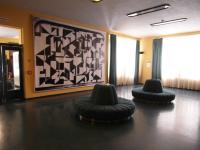 Louny, Vrchlického divadlo, replika opony Zdeňka Sýkory ve foyer, stav 2013