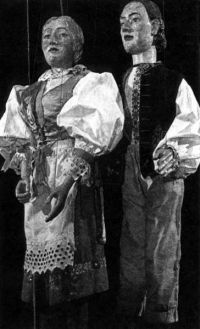 Louny, loutky řezbáře Olše, 1838